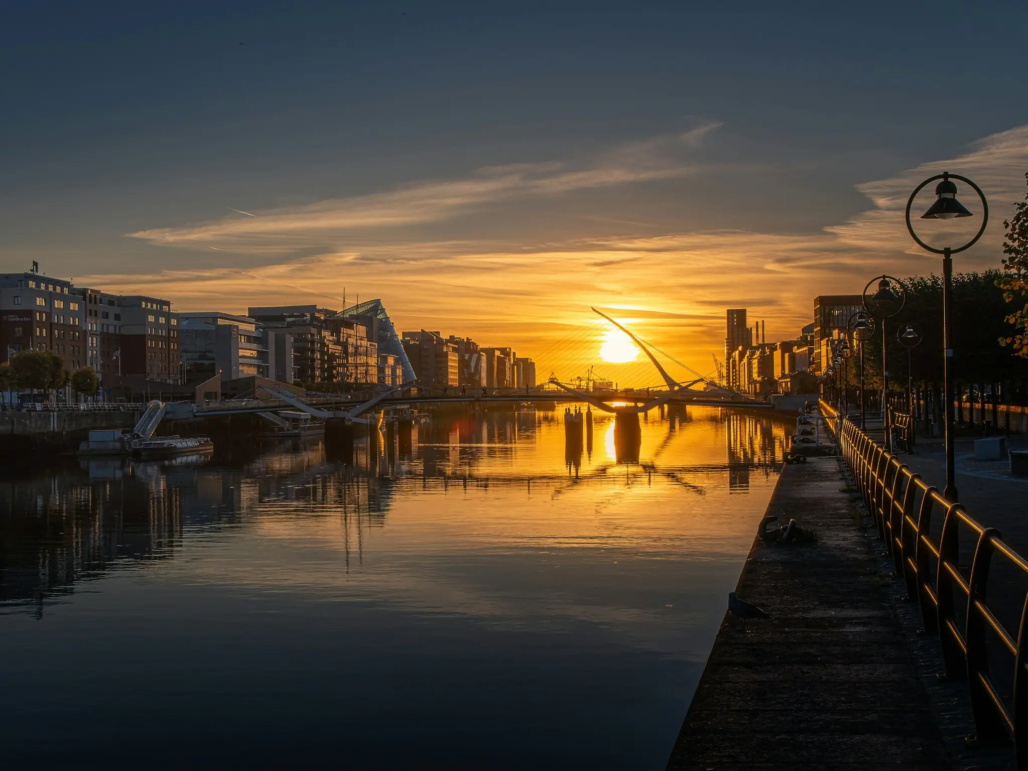 Samuel Beckett Bridge over the River Liffey in Dublin at sunset